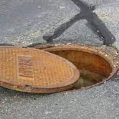 An open grid or manhole